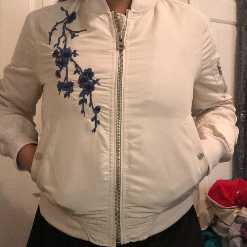 Cream / white bomber jacket with blue detailing